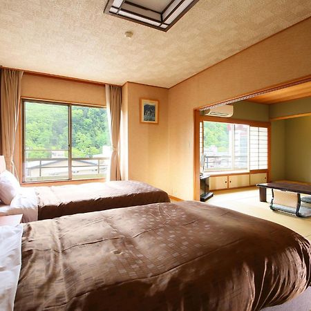 Отель Ooedo Onsen Monogatari Shinshu Kakeyu Уэда Экстерьер фото