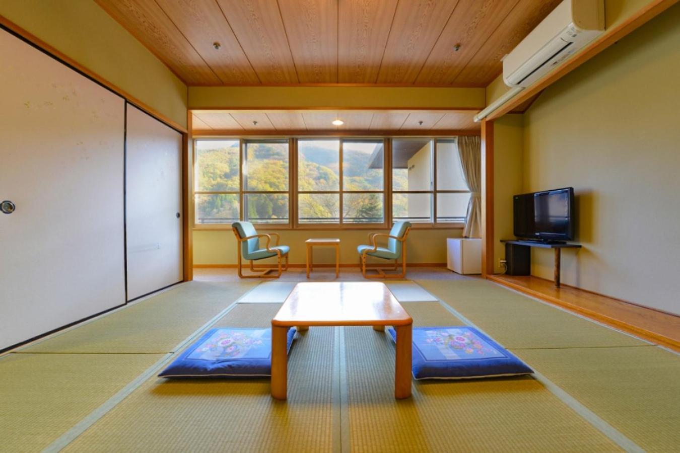 Отель Ooedo Onsen Monogatari Shinshu Kakeyu Уэда Номер фото